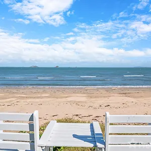 Beachfront Getaway Holiday home